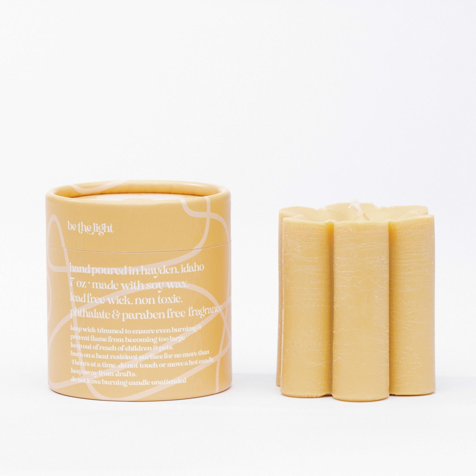 ochre daisy pillar candle • soy candle