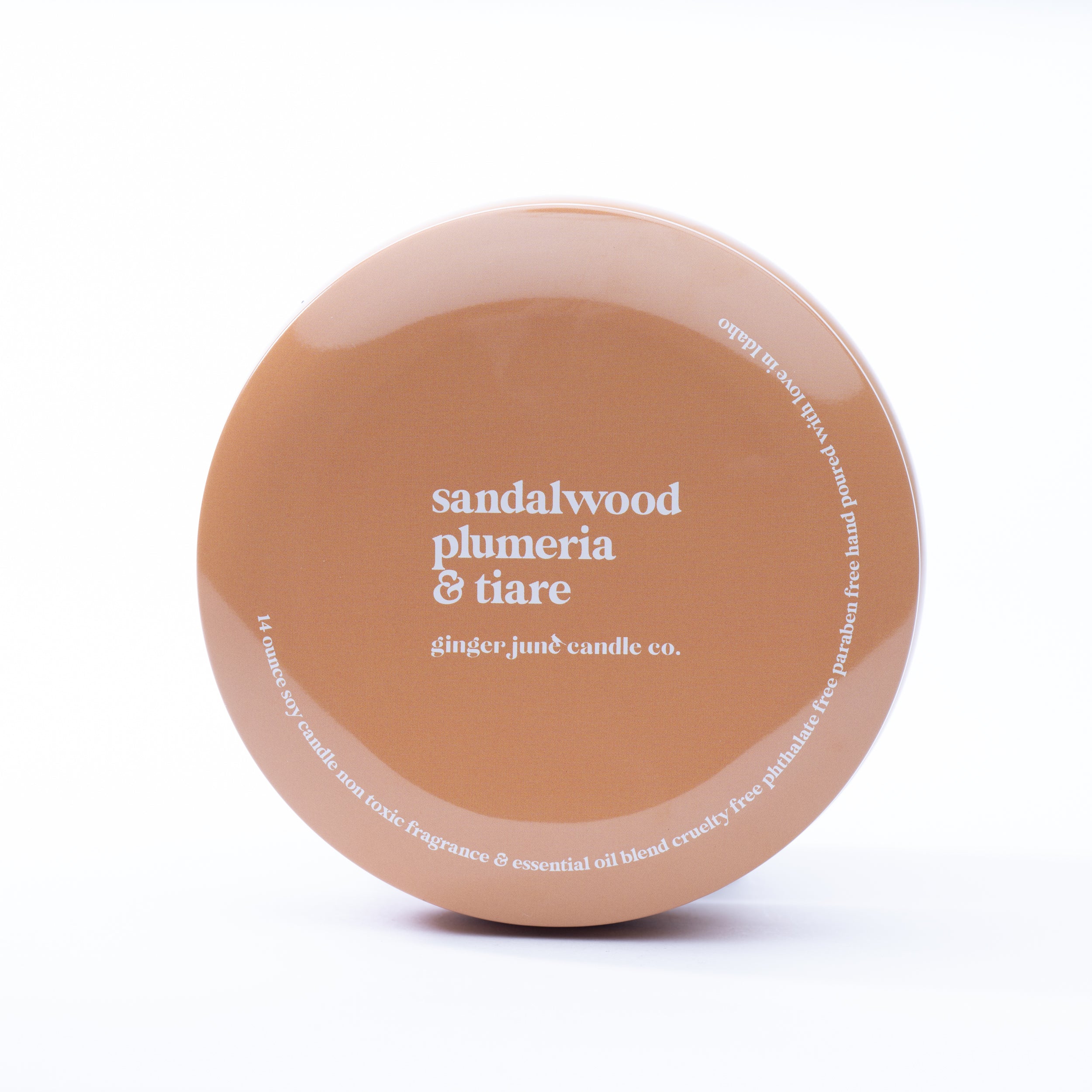 ochre tin: sandalwood + plumeria + tiare 14 oz candle