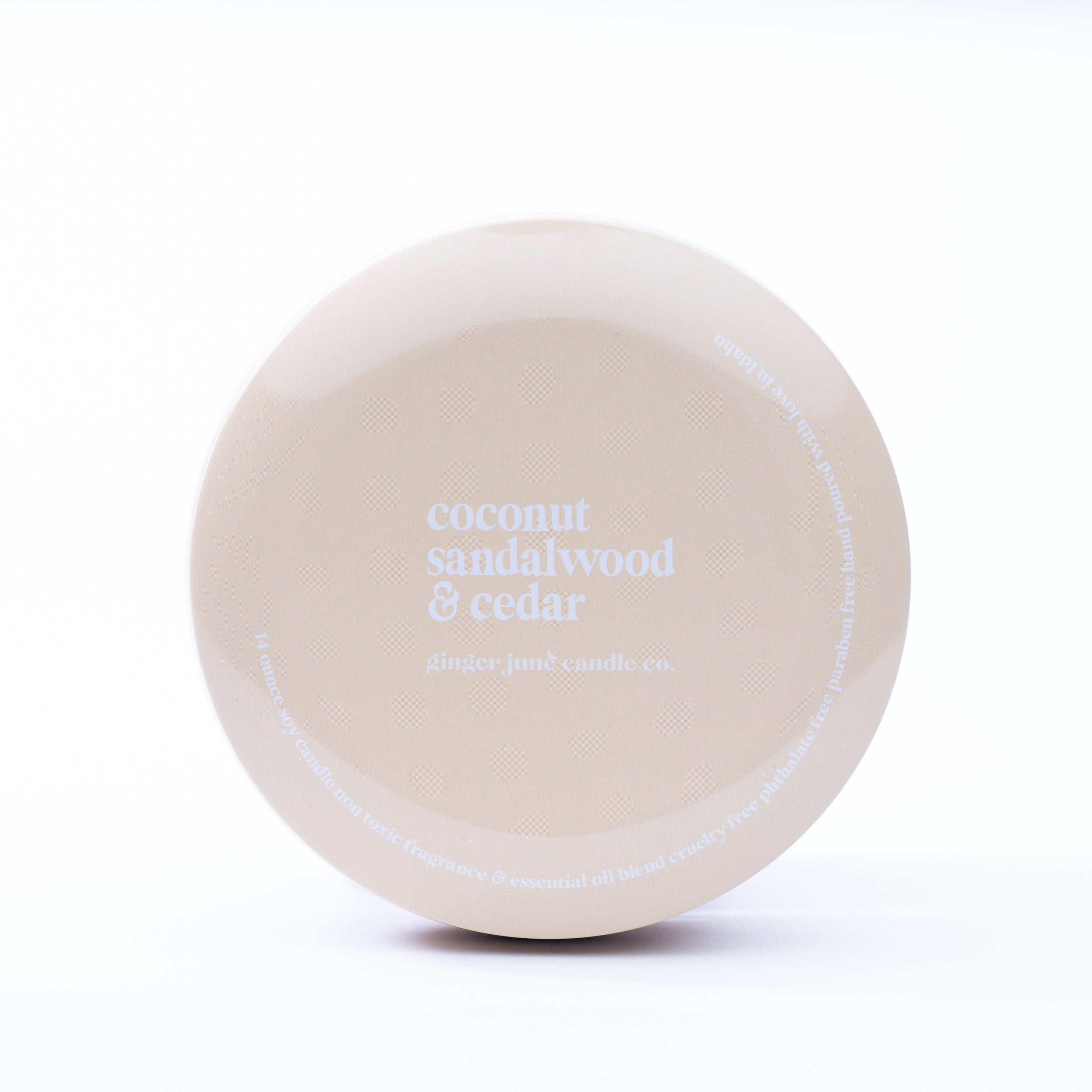 nude tin: coconut sandalwood + cedar 14 oz candle